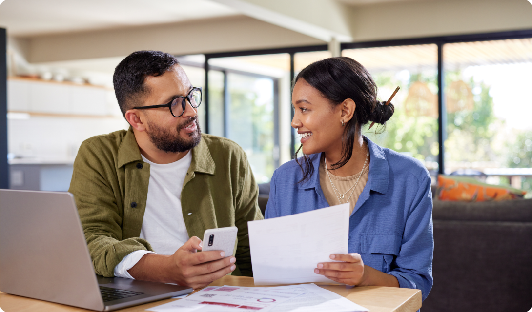 Man and woman reviewing documents together